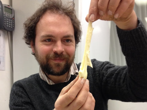Johnny Crickmore with an experimental Baron Bigod cheese, this example is very stretchy. 