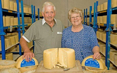 Mrs Kirkham stood with cheese