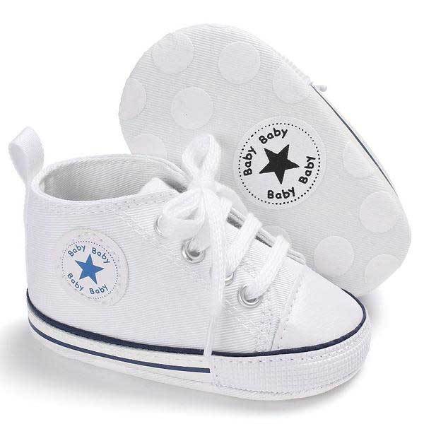 white canvas baby shoes