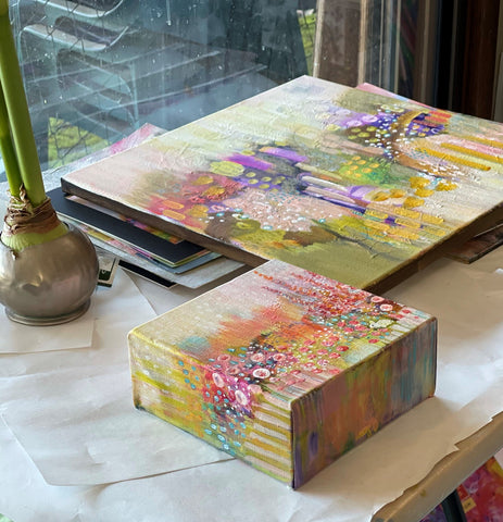 Rina PAtel Art paintings displayed on table