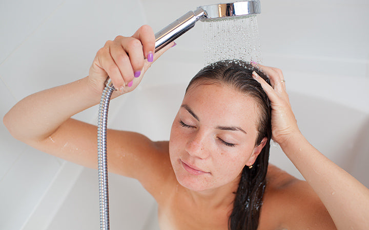 woman taking showerhot bath