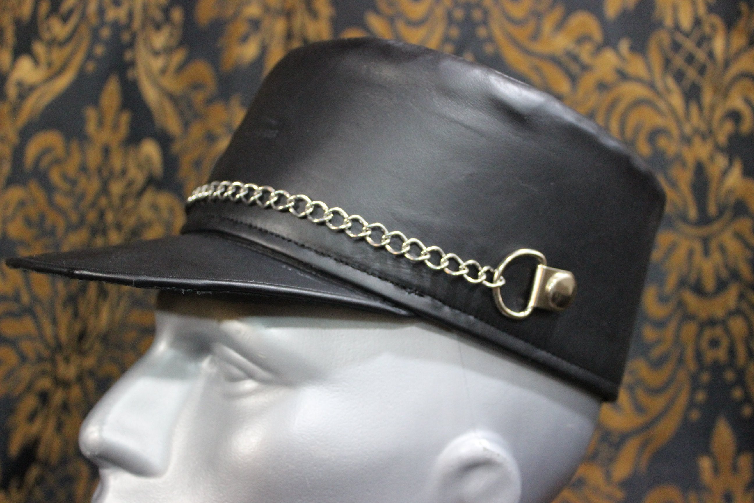 black leather kepi