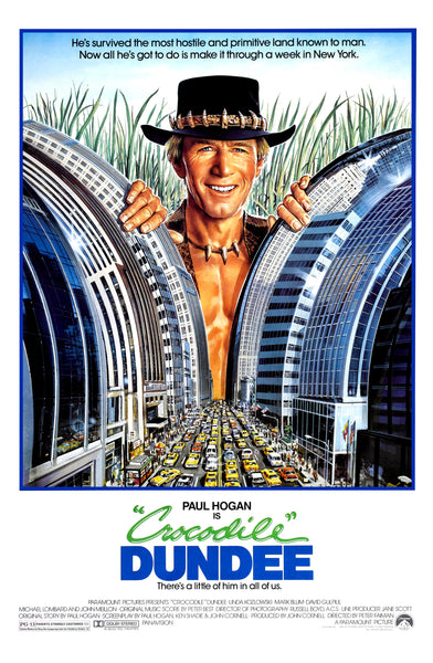 An original movie poster for the film Crocodile Dundee with artwork by Daniel Goozee