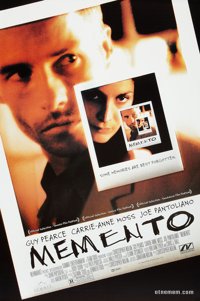 An original movie poster for the Christopher Nolan film Memento