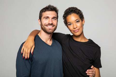 A couple wearing Classic T-shirts