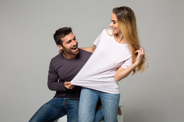 Happy couple wearing durable T-shirts