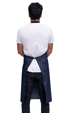 Back view image of person wearing an indigo denim apron.