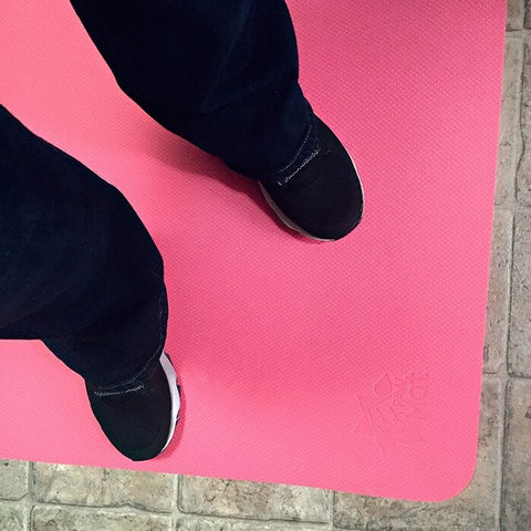 Person Standing on a Pretty in Pink PawMat Elite Floor Mat