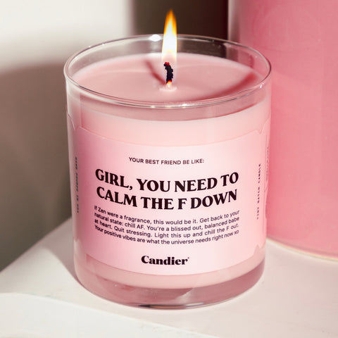 a pink candle with a message that reads Girl You Need To Calm The F Down