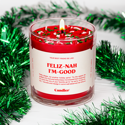 Festive Christmas themed candle with a label that reads Feliz Nah I'm Good