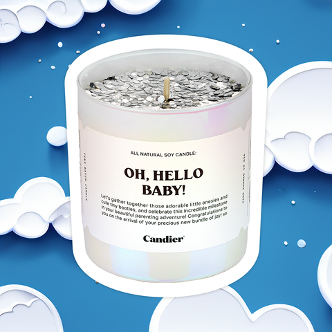 a baby themed candle with a label that reads Oh Hello Baby