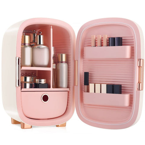 Cute pink mini fridge full of beauty products