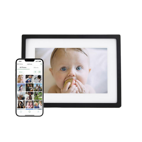 a smartphone beside a digital picture frame