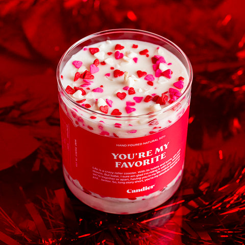 Valentines Day themed candle with heart shaped sprinkles and a label that reads You're My Favorite