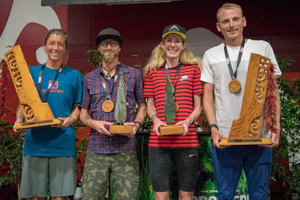 The Tarawera Ultra 100 mile and 100km male and female winners, with their mere trophies
