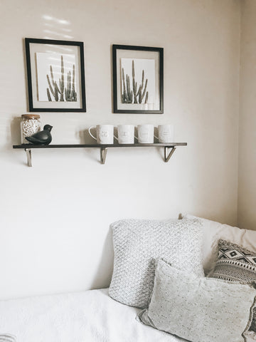 Image showing wall shelf with brackets and two prints above