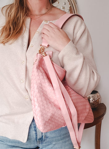 remi woven vegan leather bag in pink 