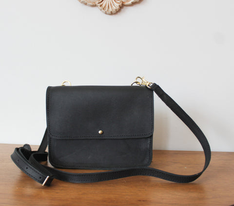 small black leather fold over crossbody 