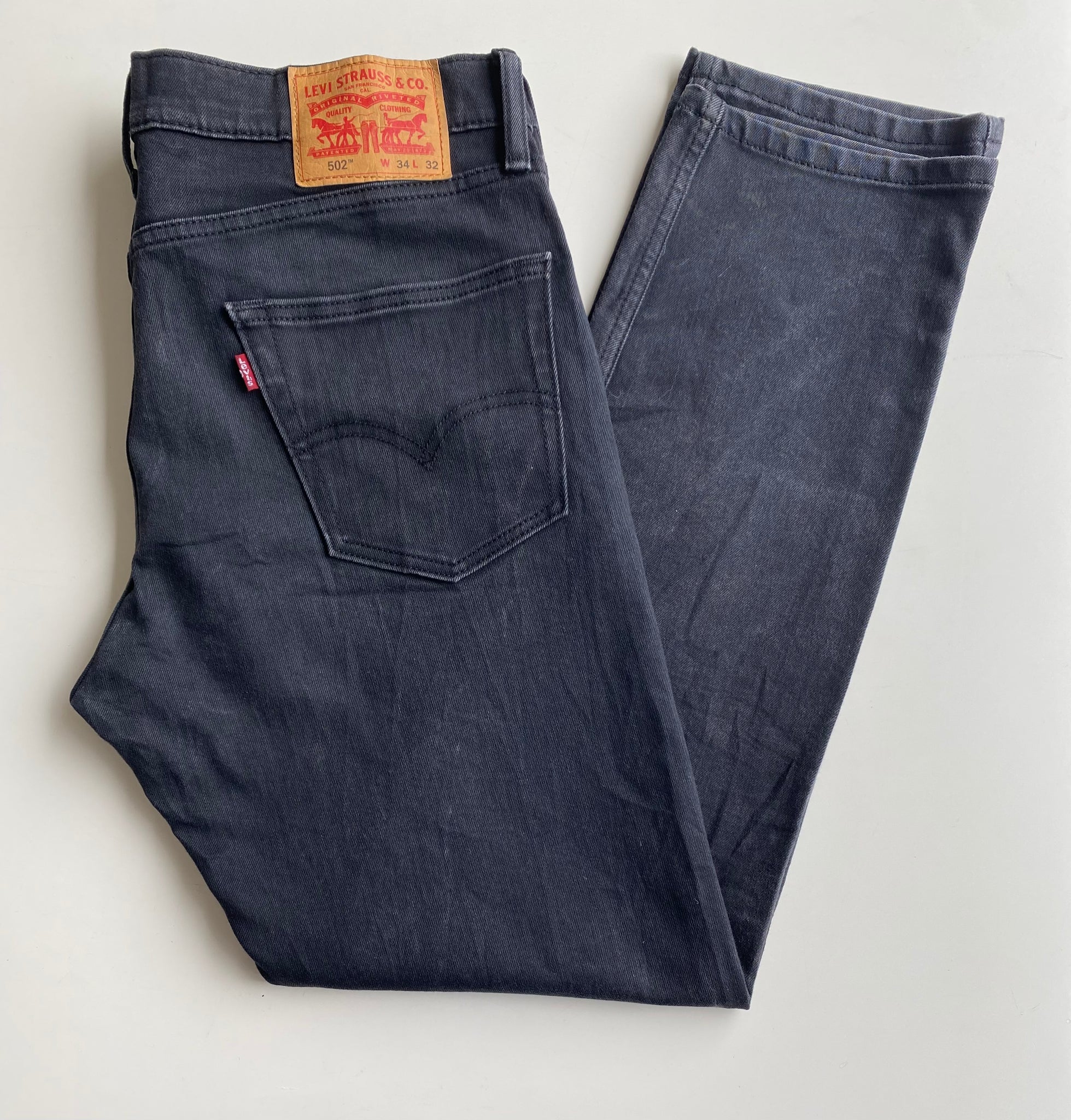 Levi's 502 W34 L30 – Red Cactus Vintage