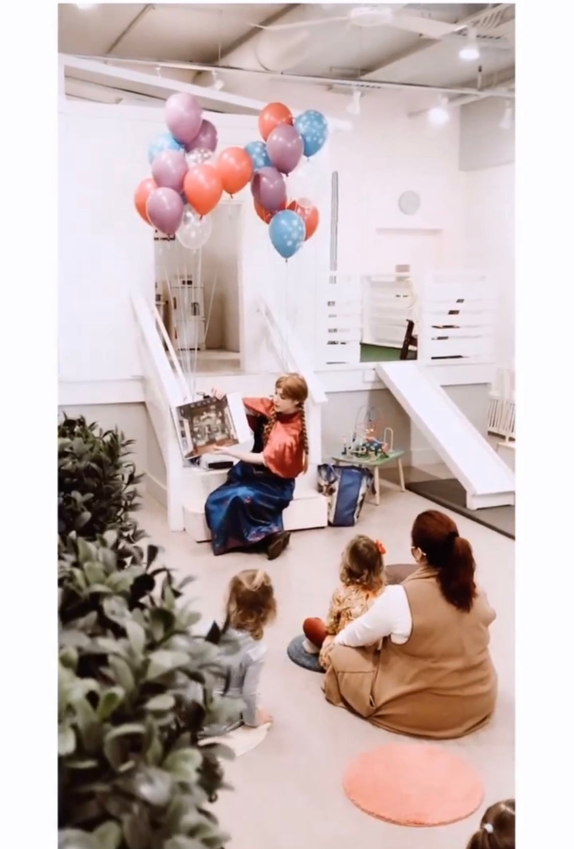 Princess Ana reading to kids at story time at Waterlemon 