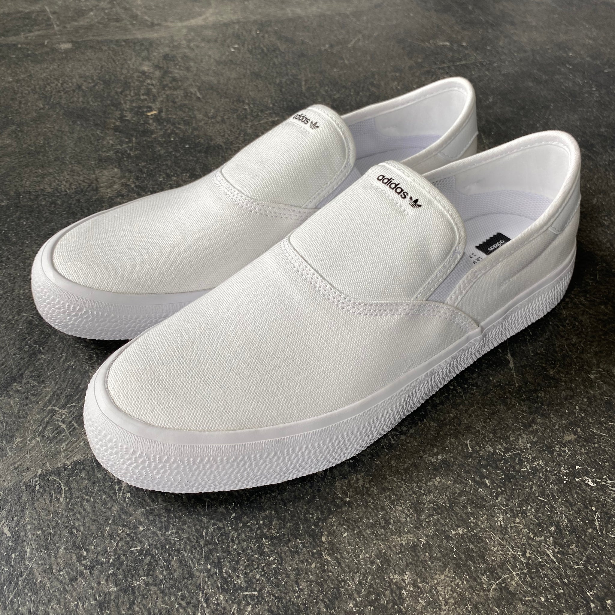 adidas slip on white