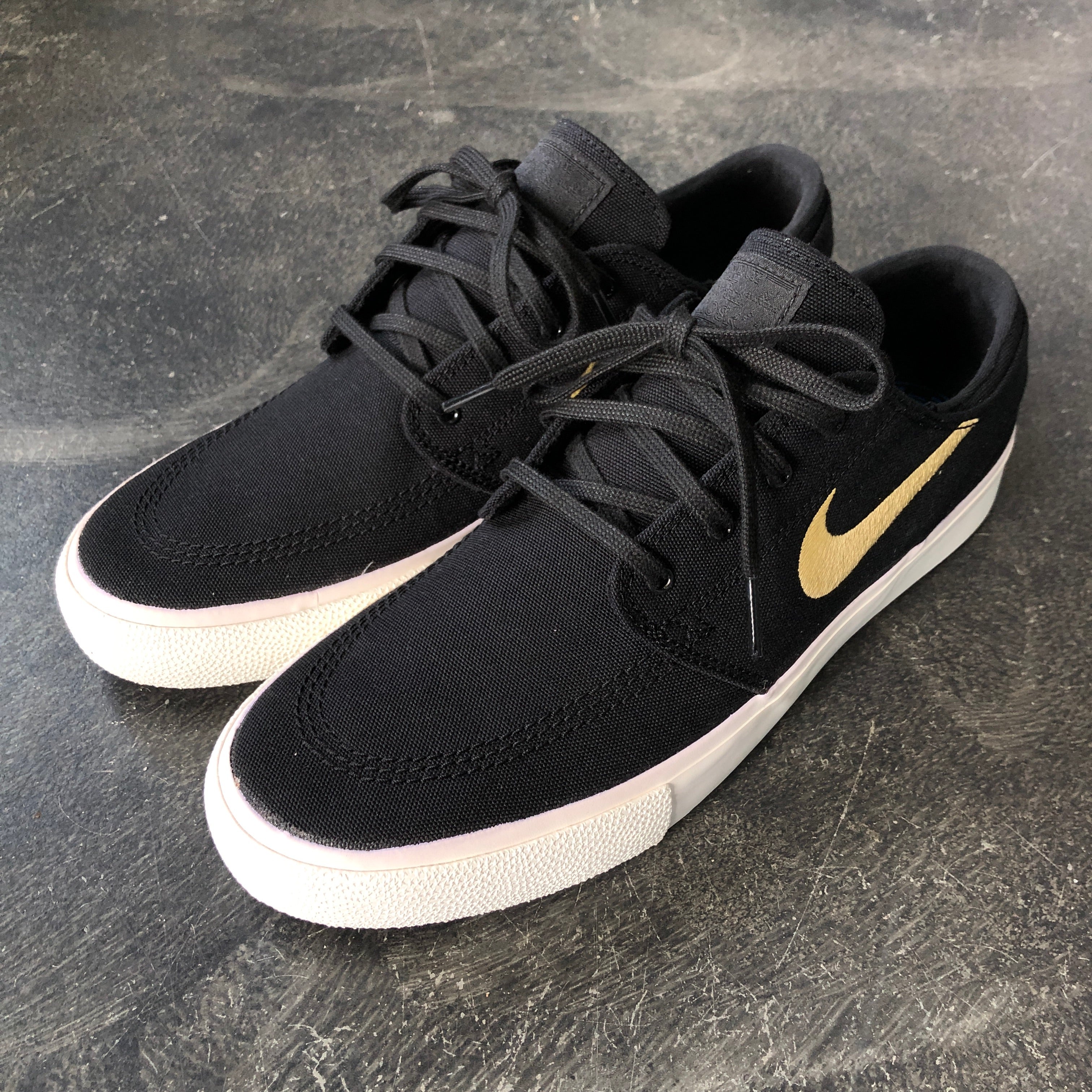 nike stefan janoski black and gold