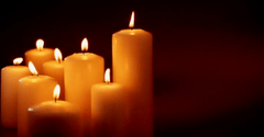 Group of Pure Beeswax Pillar Candles Illuminating Spiritual, Prayer, and Ritual Settings with Warm Glow
