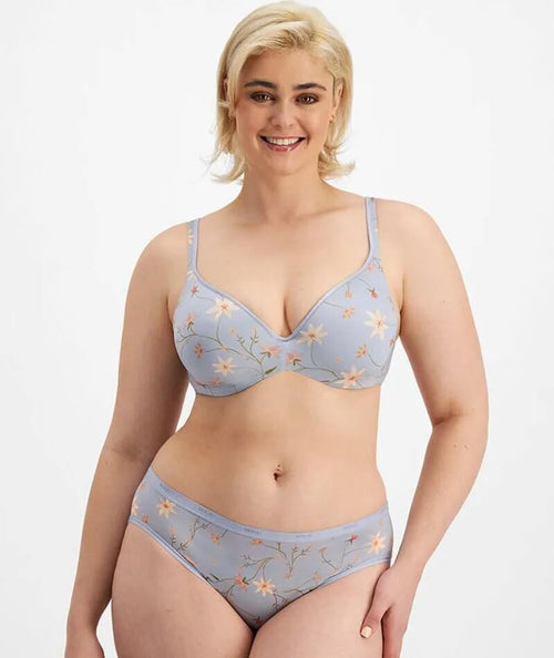 Berlei - Barely There in full bloom. Click the link to get the matching set  >  #BerleiAus #InSupportOfYou [ID: A campaign image  of Ella sitting on a chair while wearing the