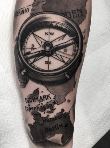 Compass tattoo arm
