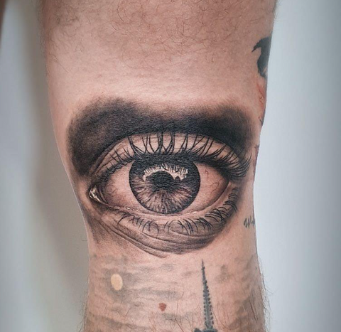 Eye tattoo realism black and grey