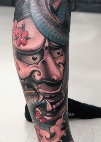 Hannya mask tattoo leg