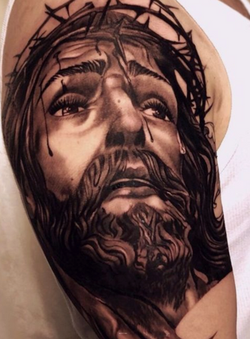 Jesus christ tattoo arm black and grey realism