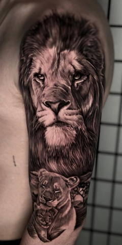 Lion tattoo arm black and grey realism