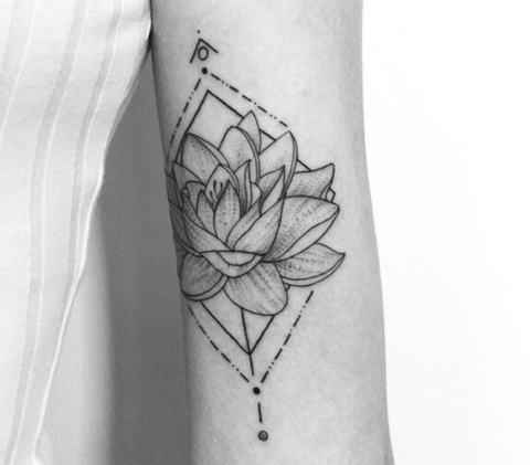 Lotus flower tattoo fine line arm