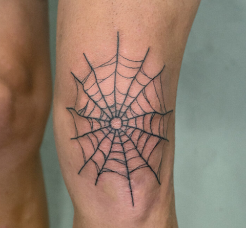 Spider web tattoo knee
