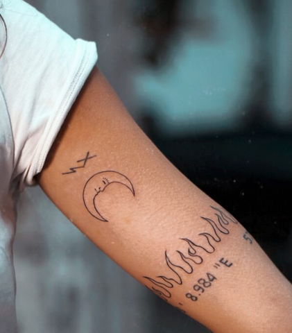 Moon tattoo arm