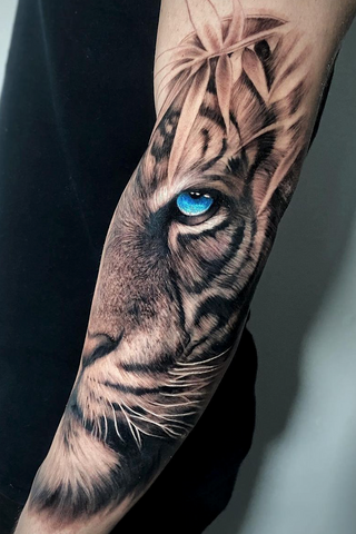 Tattoo tiger black and grey realism forearm