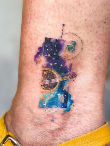 Galaxy watercolor tattoo with planets