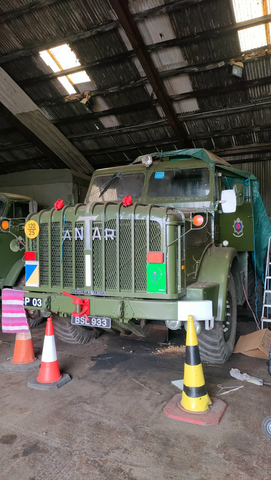 Decorated Army Truck inside a warehouse