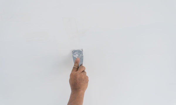 Applying Drywall Spackle to a Drywall Hole