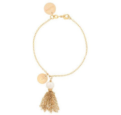 taudrey tassels on a gold leash bracelet