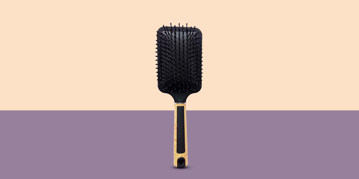 PADDLE BRUSH WITH EXTENDED BRISTLES