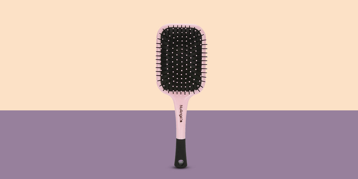 PADDLE BRUSH WITH WIDE SPACED BRISTLES