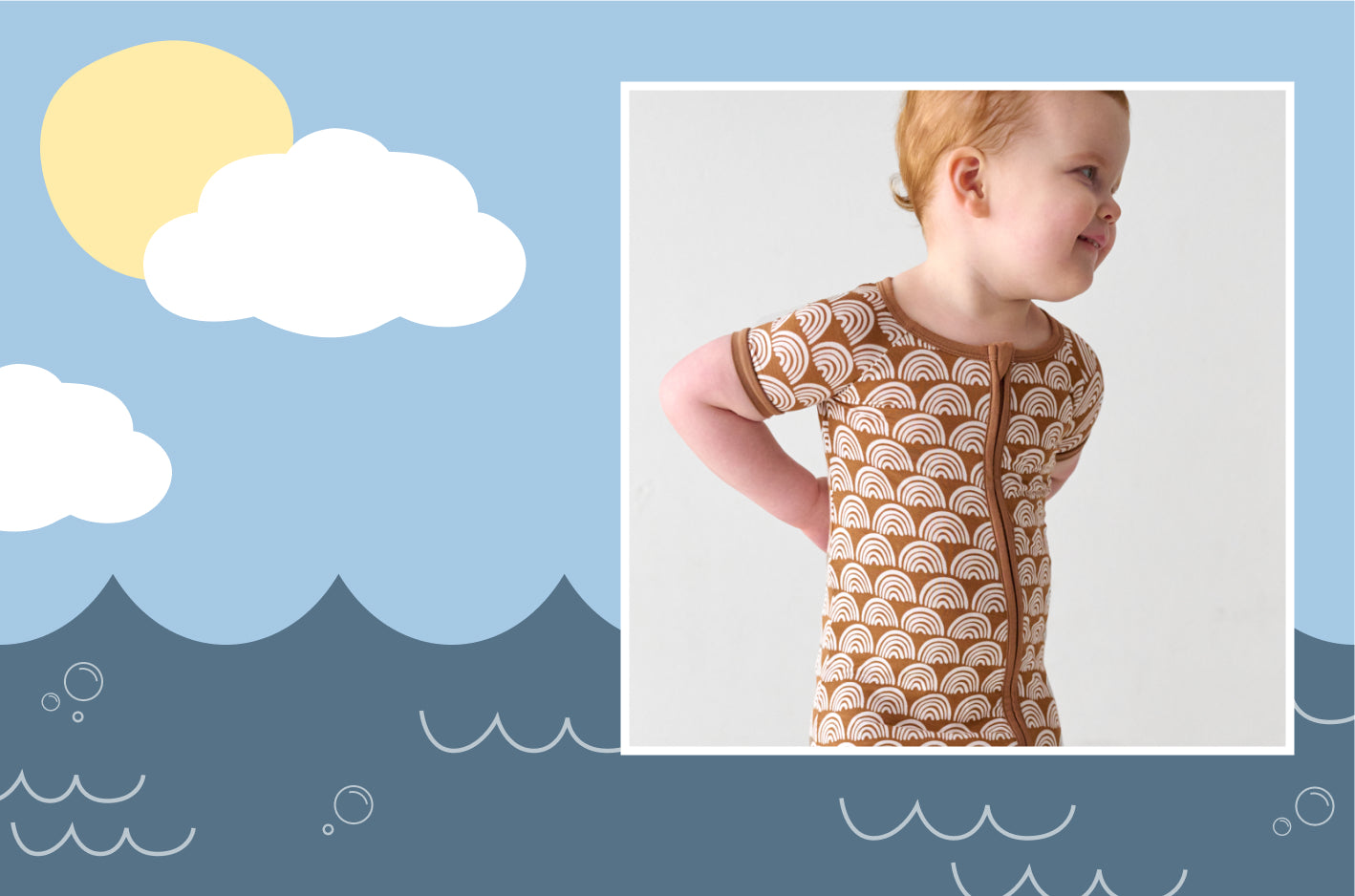 Child wearing a Rust Rainbows Shorty Romper with a beachy background