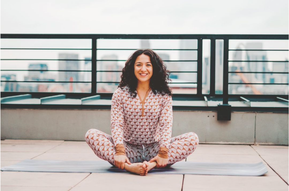 Woman demonstrating the butterfly yoga pose