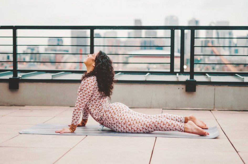 Woman demonstrating the cobra yoga pose
