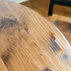 Closeup of hand planed solid pine table top, stained williams pine