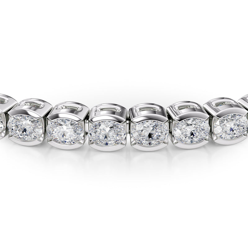 East West Half Bezel Oval Tennis Bracelet 5.0tcw WG