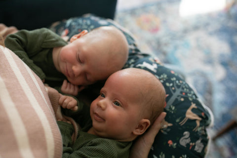 cute twin babies smiling