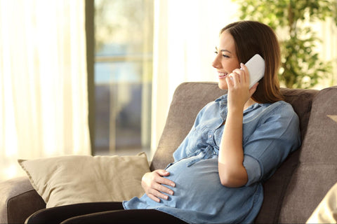 pregnant woman on the phone